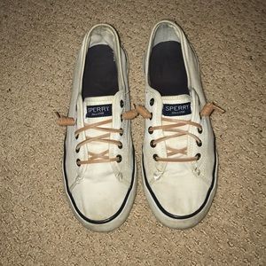 White Sperry sneakers